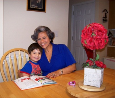 Matthew reads to Grandma Isabel
